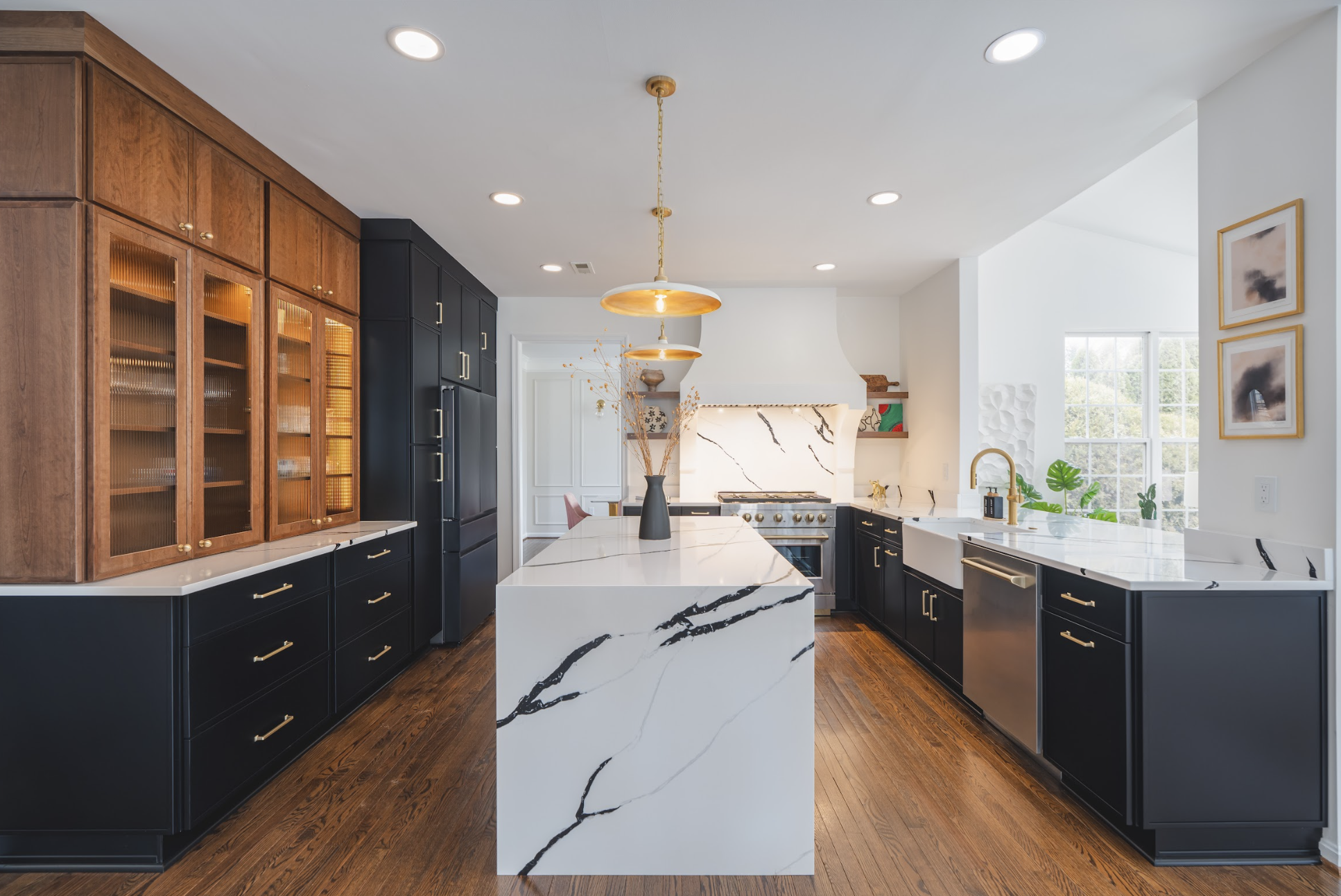 Modern kitchen with sleek finishes, warm lighting, and a clean, inviting design in Frederick, Maryland.